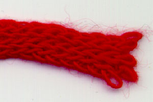 roter Strickschlauch