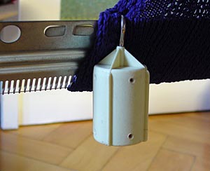 Anschlagkamm hochrollen